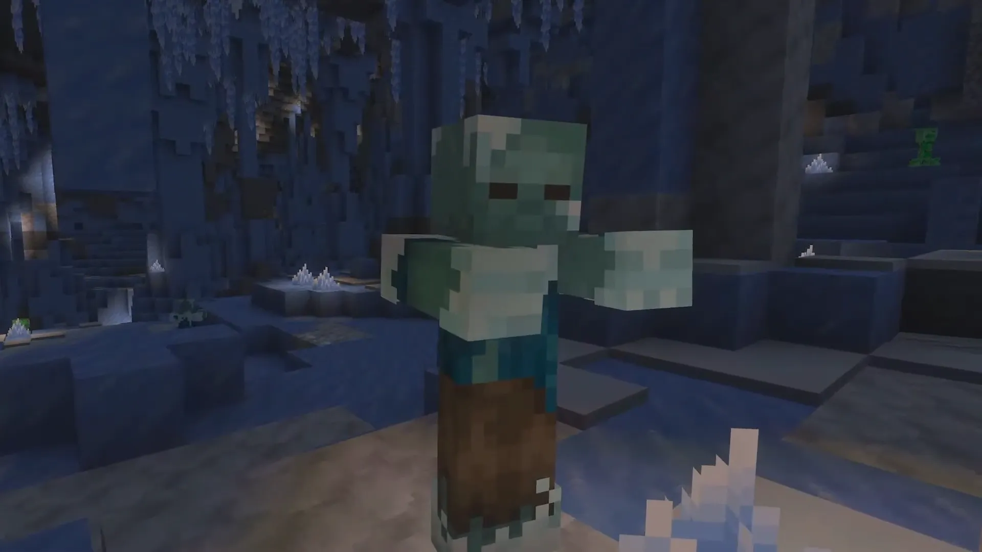 Frozen Zombie dans une grotte de glace avec cristaux de glace et un creeper en arrière-plan, Ice Caves