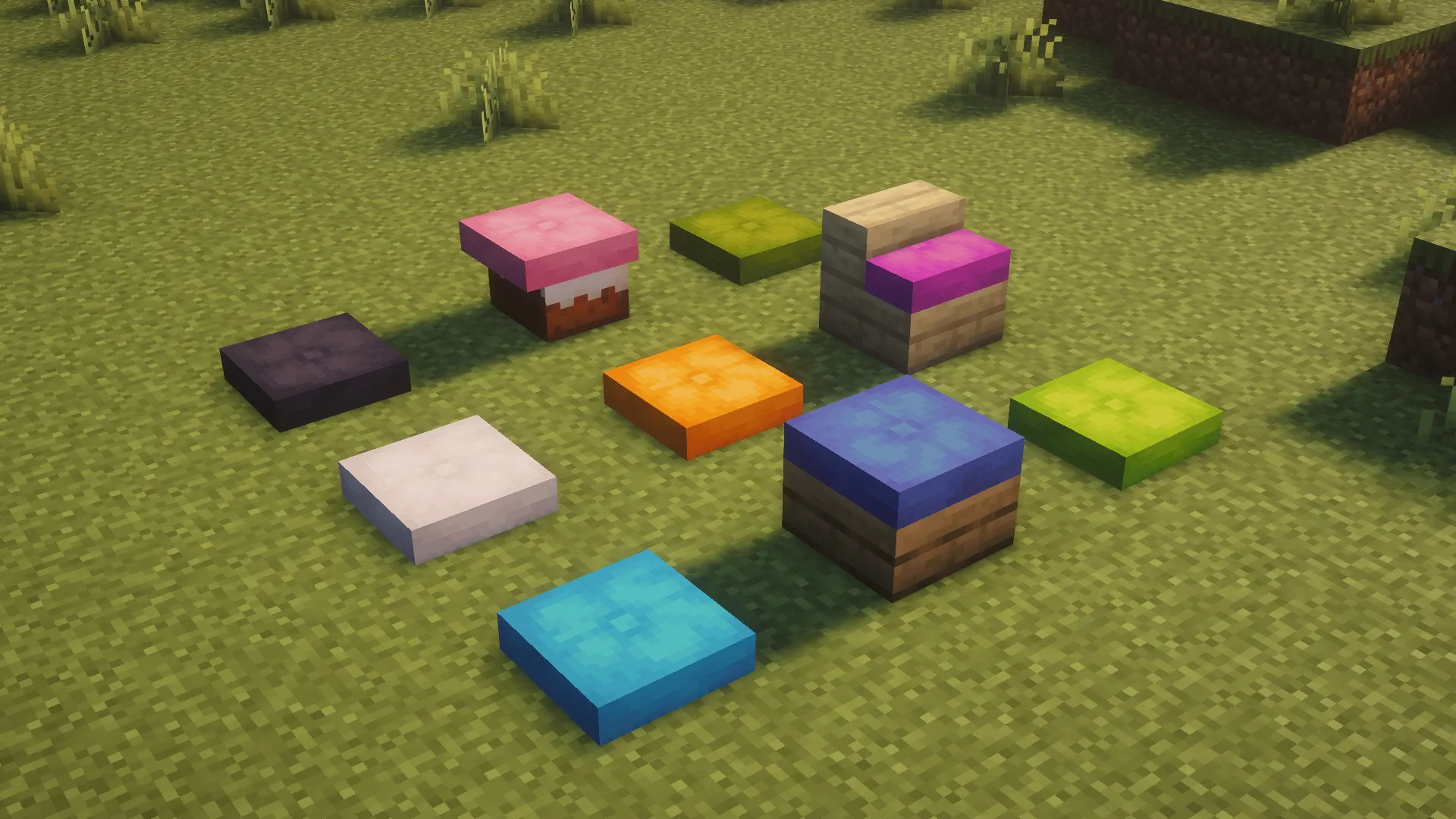 Coussins colorés et sièges dans l'herbe
