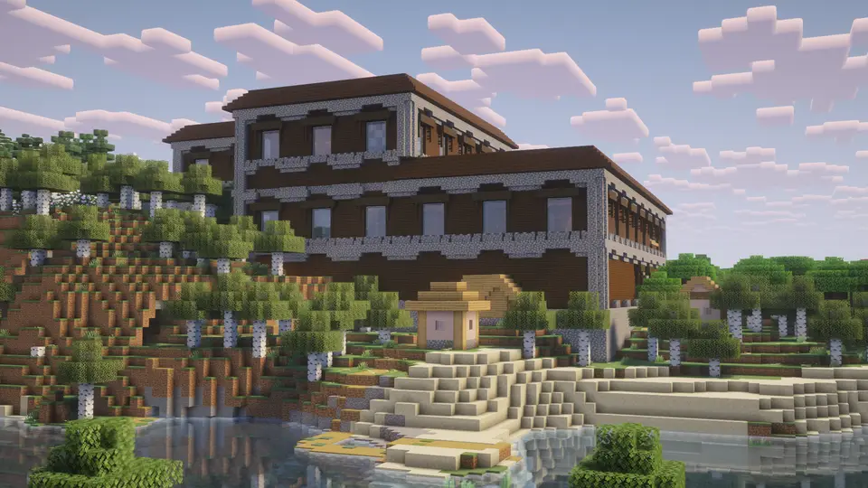Capture d’écran de la seed Woodland Mansion avec un village à l'intérieur juste au spawn