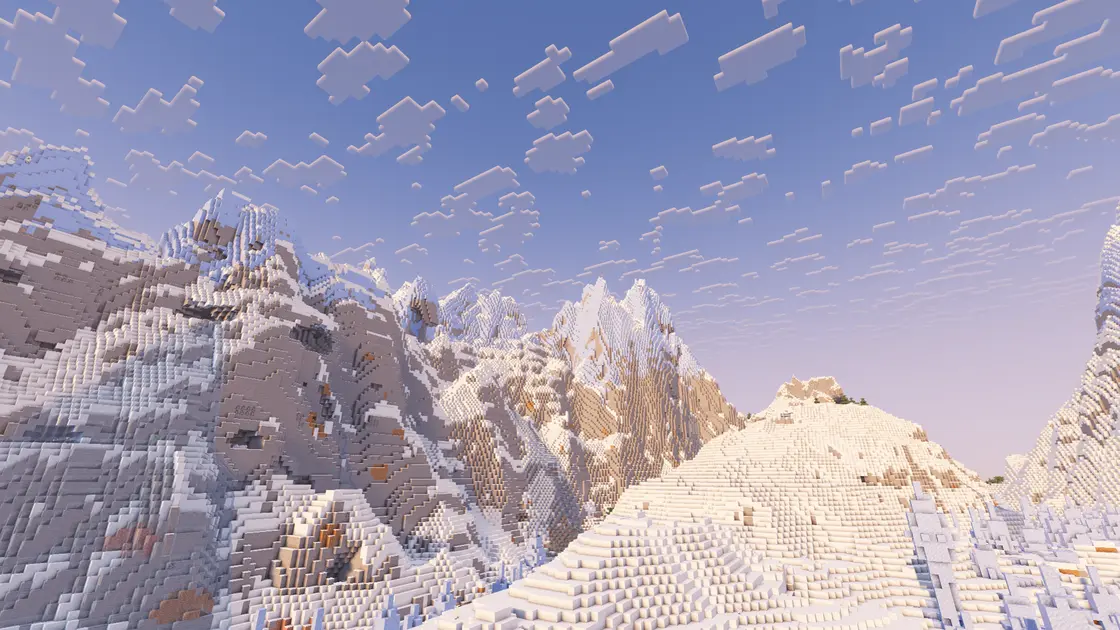 Spawn entre d'immenses montagnes enneigées avec biomes de glace