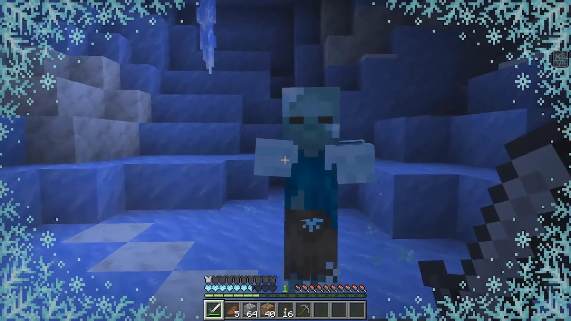 Combat contre un Frozen Zombie dans les Ice Caves en vue à la première personne, Minecraft LIVE 2026