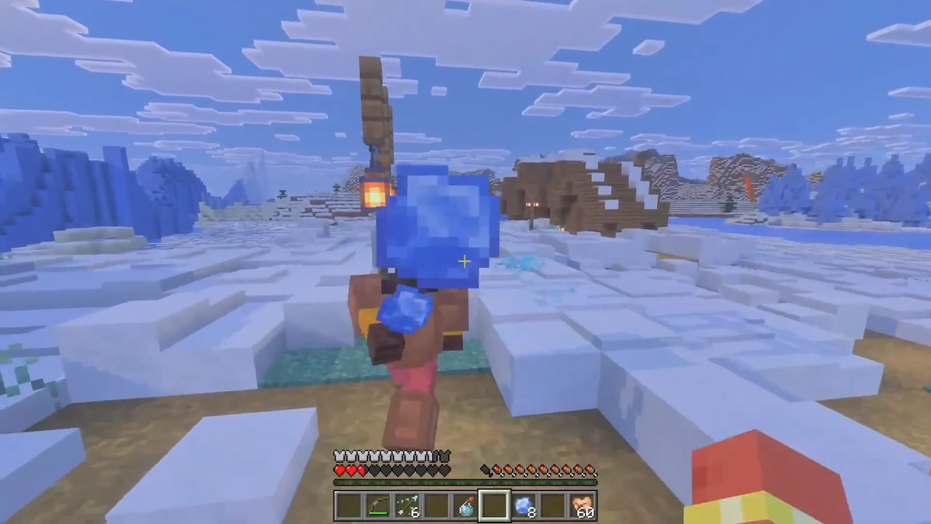 Joueur lançant une boule de glace avec effet de gel dans un biome enneigé Minecraft, Ice Caves